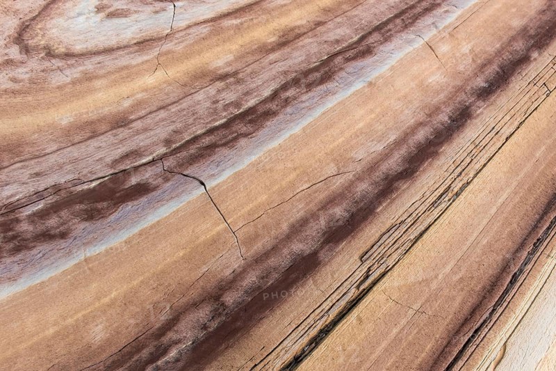 Limestone coloured red by iron and whitish-yellow dolomite