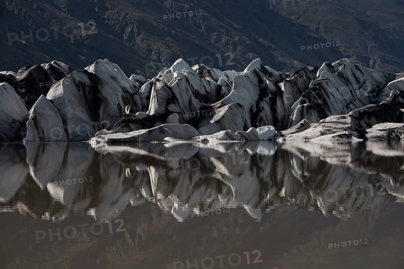 Glacier tongue reflected in the water