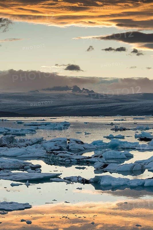Small icebergs in the glacier lagoon Jokulsarlon at sunset