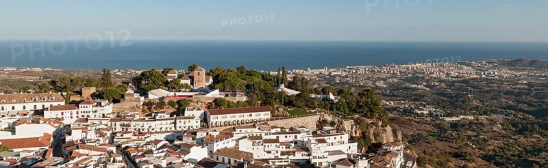 Panoramic view of village and coastal resort of Mijas