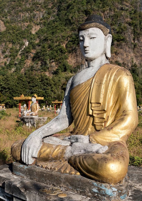 Buddha statue in Lumbini Garden under Mt Zwegabin