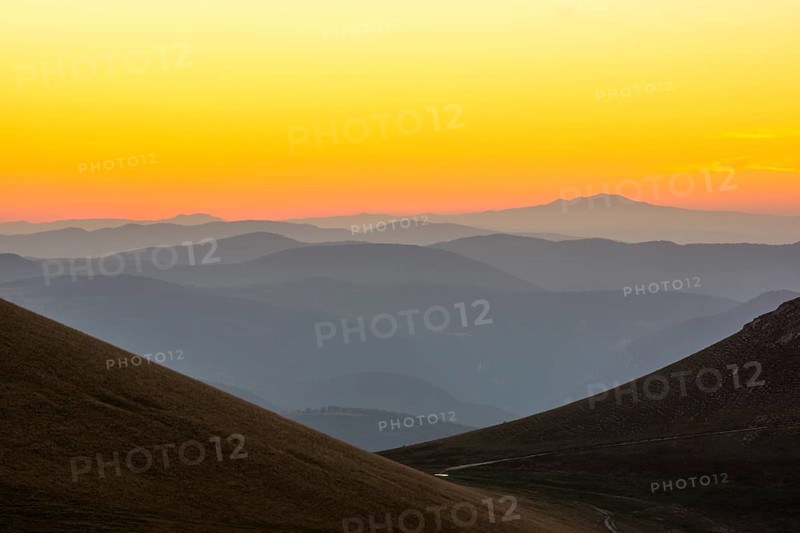 Views of the Sibillini Mountains at sunset from Castelluccio di Norcia