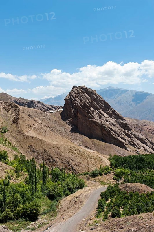 Steep towering rock and ruins of Alamut mountain fortress
