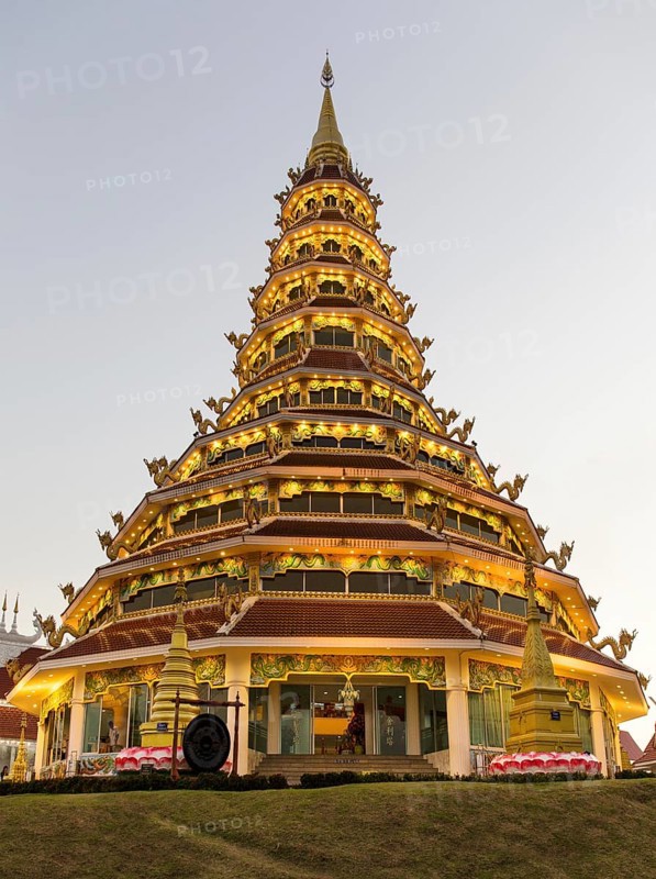 Illuminated nine-story pagoda of the Wat Huay Pla Kang temple