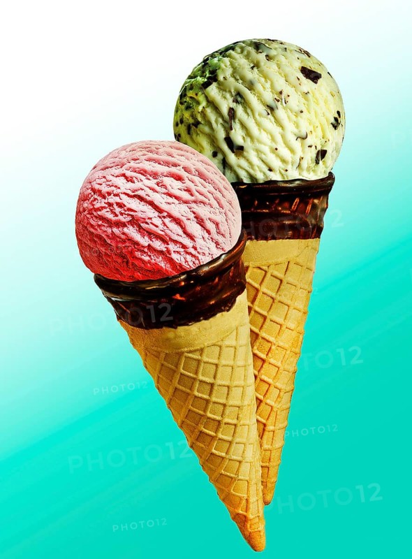 Two ice cream cones with scoops of ice cream