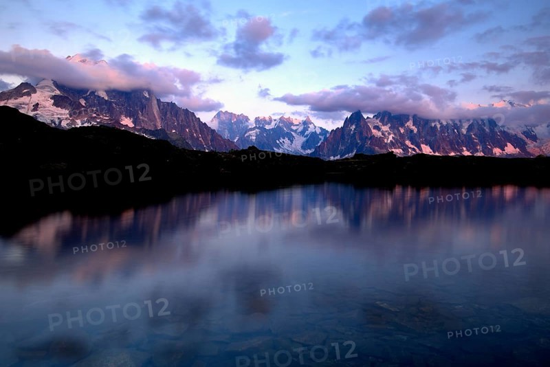 Mont Blanc massif in the evening light reflected in Lac de Chesserys