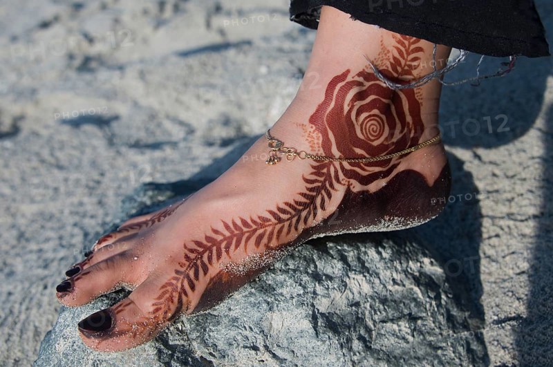 Omani woman's foot with Henna tattoo
