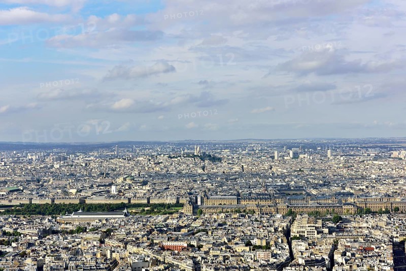 Cimentiere de Montparnasse and city centre with Louvre and Montmartre
