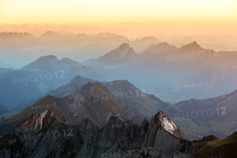 Evening mood at the blue hour on the Santis with a view of the Alps of Eastern Switzerland