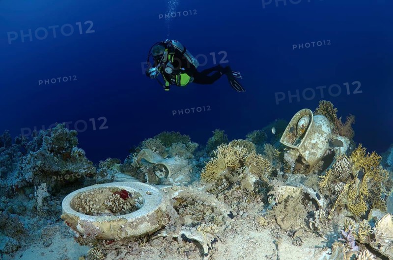 Diver looking at the plumbing on the shipwrecks in Ras Muhammad National Park