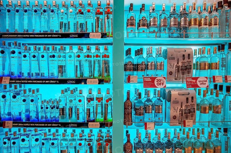 Shelf with vodka bottles