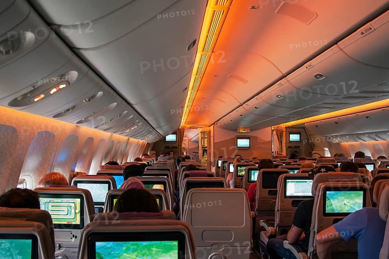 Boeing 777-300 passenger compartment economy class during flight Dubai-Frankfurt
