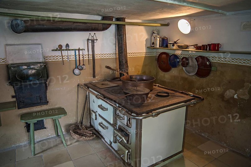 Kitchen with old wood stove or coal stove