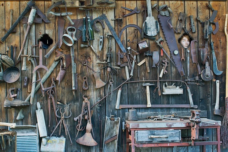 Old tools on a shed wall
