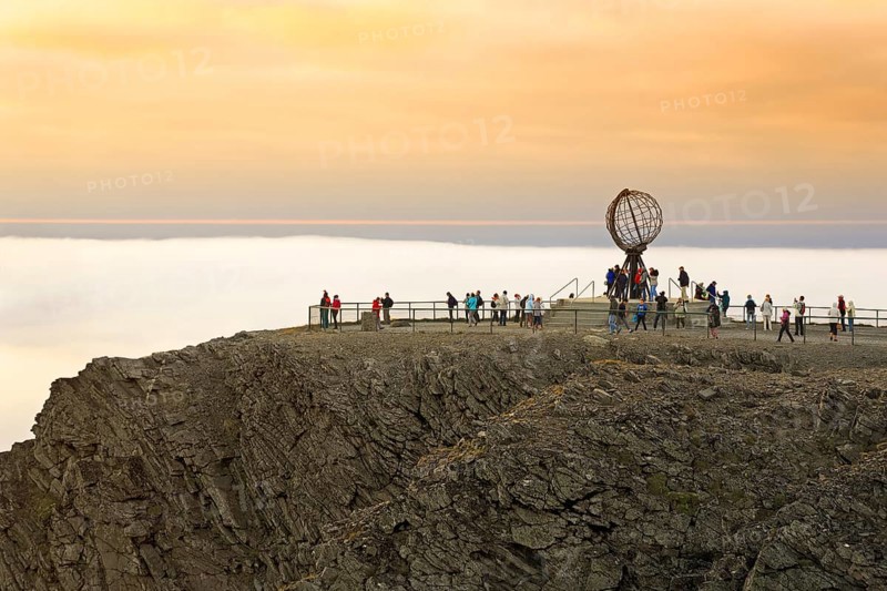 Nordkapp platform with globe in front of evening sky