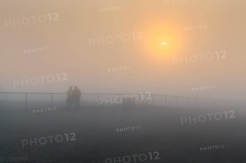 midnight sun in fog