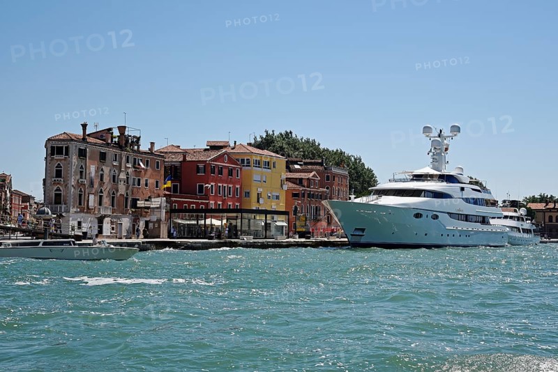 Large yacht in front of houses by San Marco basin