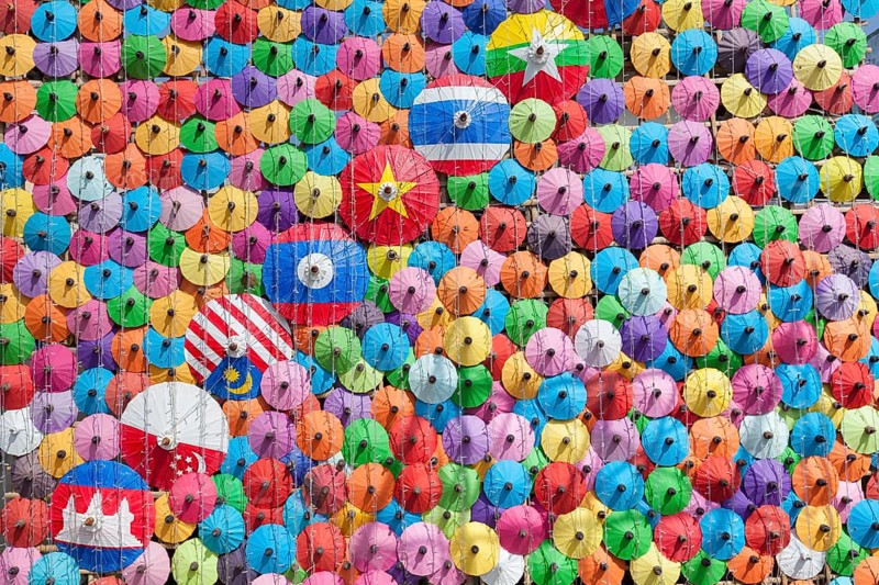 Many colourful umbrellas suspended in mid-air