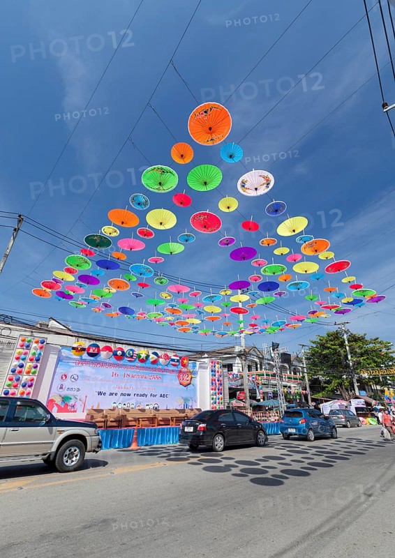 Many colourful umbrellas suspended in mid-air