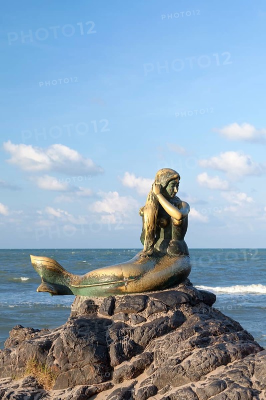 Golden mermaid statue on Samila beach