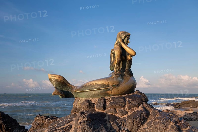 Golden mermaid statue on Samila beach