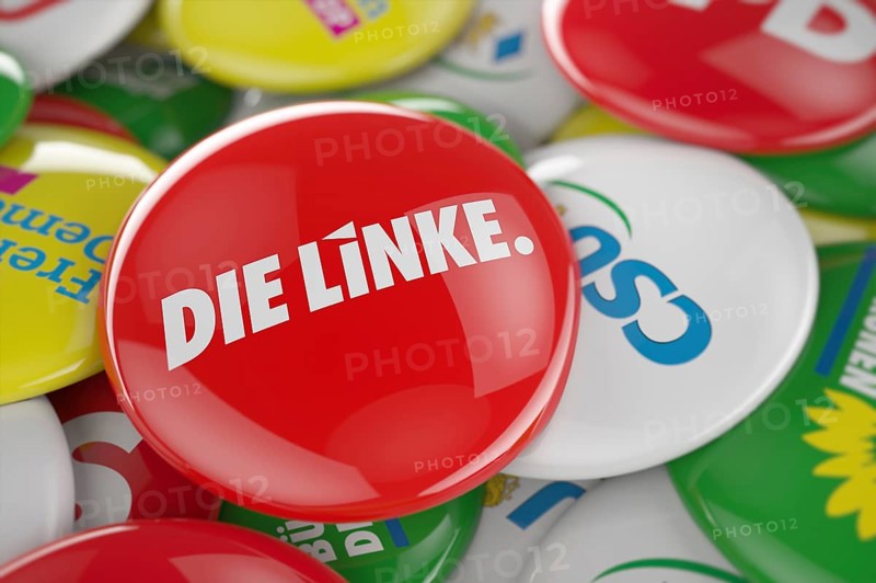 German political party Die Linke button in front between other governing party buttons