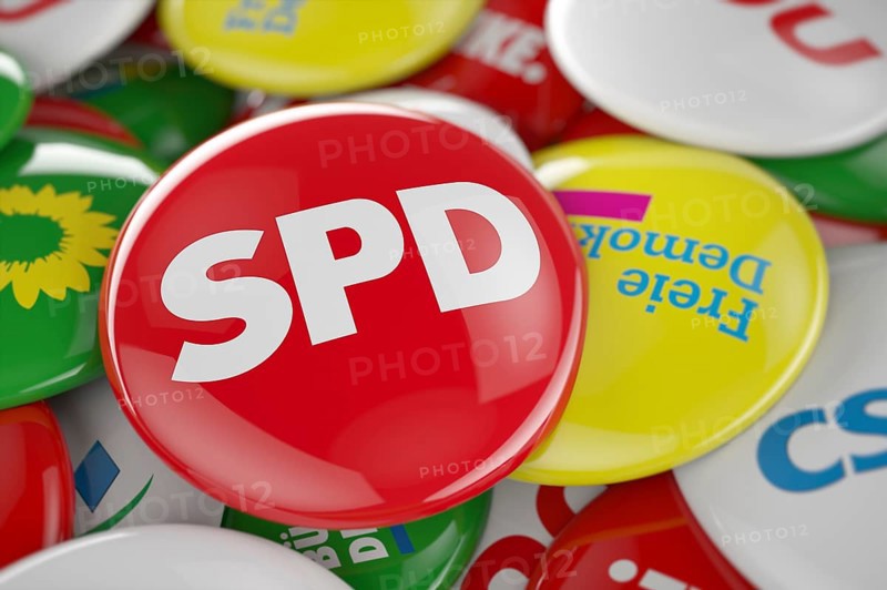 German political party SPD button in front between other governing party buttons