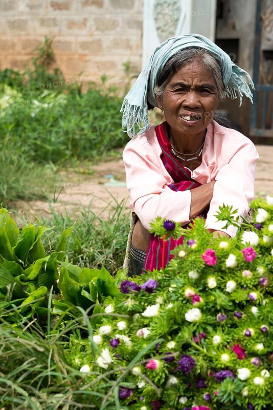 Woman sells flowers