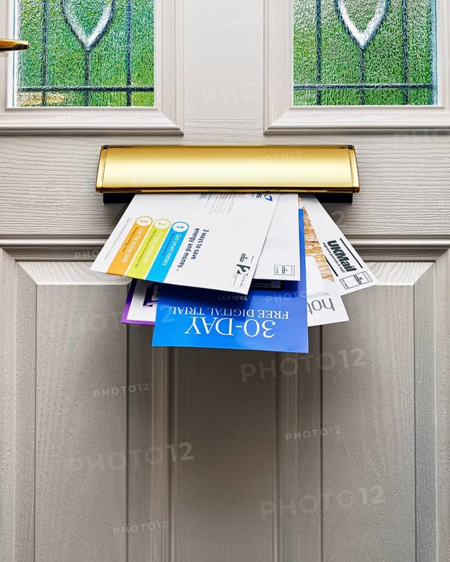 Letters coming through a letterbox
