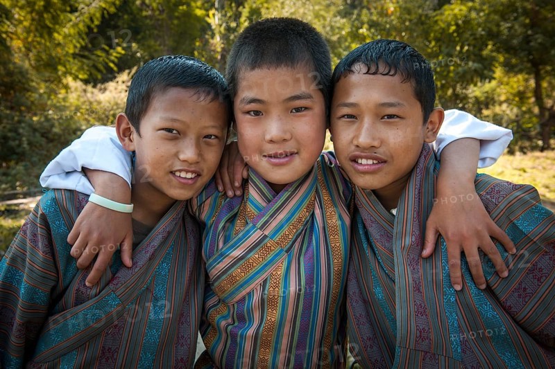 Three boys with traditional clothing