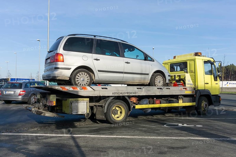 Car on tow-away vehicle