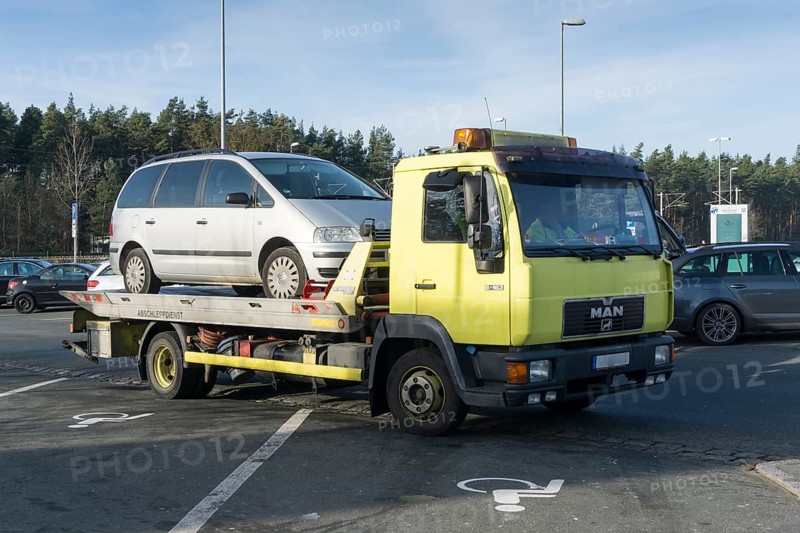 Car on tow-away vehicle