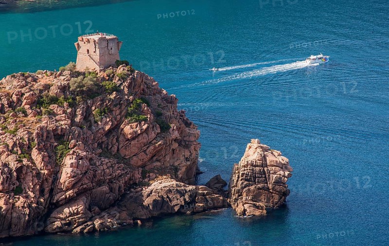 Genoese watchtower on cliff above the sea