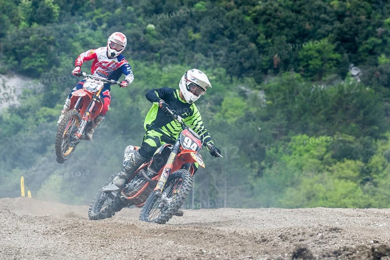 Two motorcyclists on motocross bikes