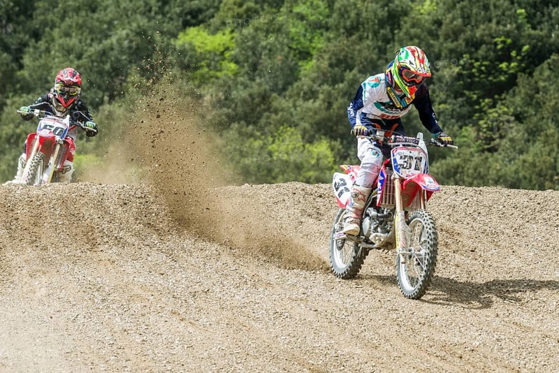 Two motorcyclists on motocross bikes