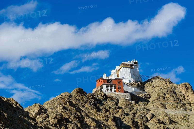 The monastery Namgyal Tsemo Gompa and Tsemo Fort on a mountain ridge