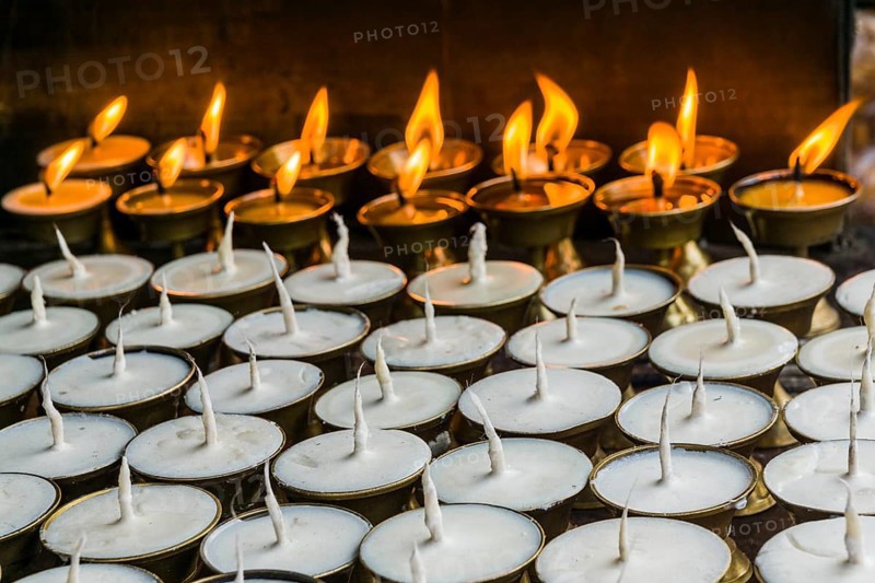 Many butter lamps are lightened at a temple in Boudha