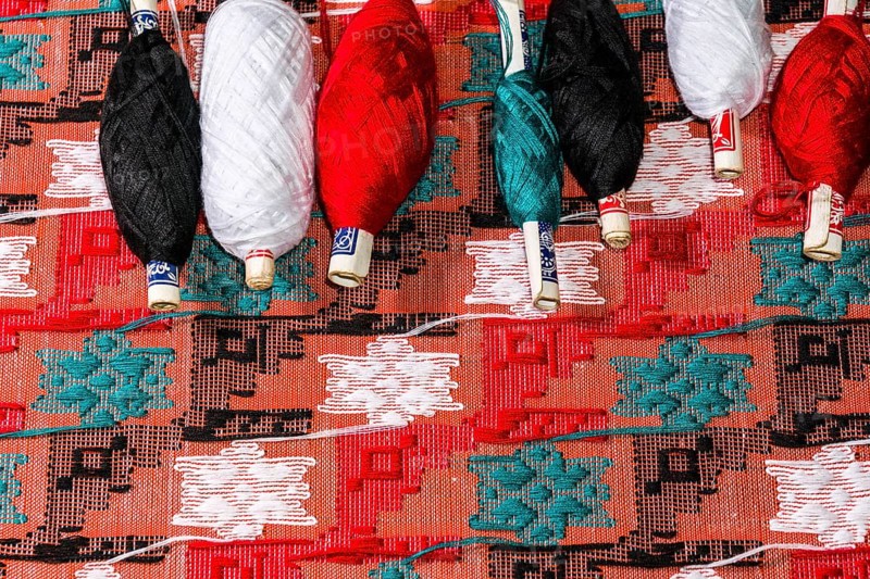 Colorful threads for weaving the Dhaka topi