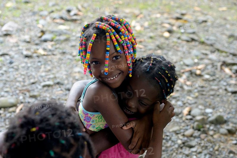 Two girls hugging each other