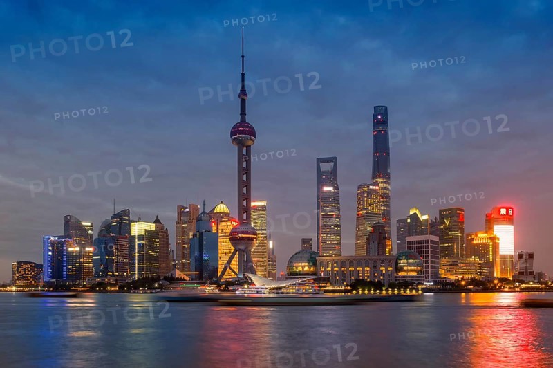 Pudong financial district with Oriental Pearl Tower at night
