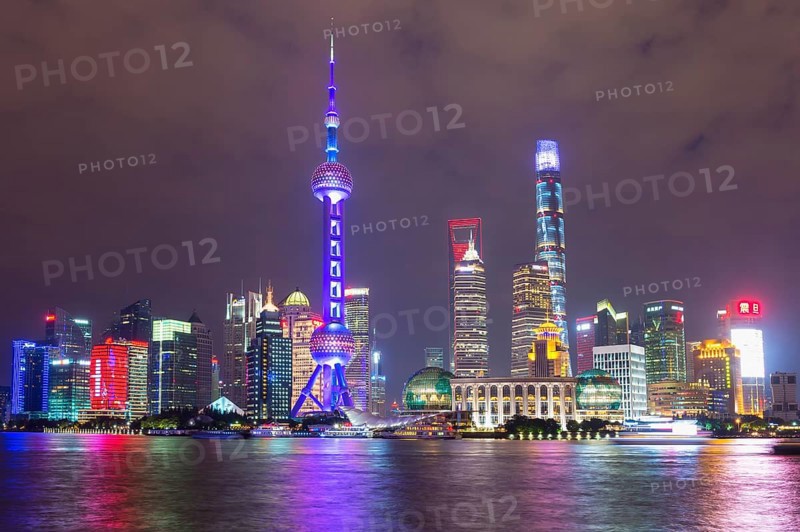 Pudong financial district with Oriental Pearl Tower at night