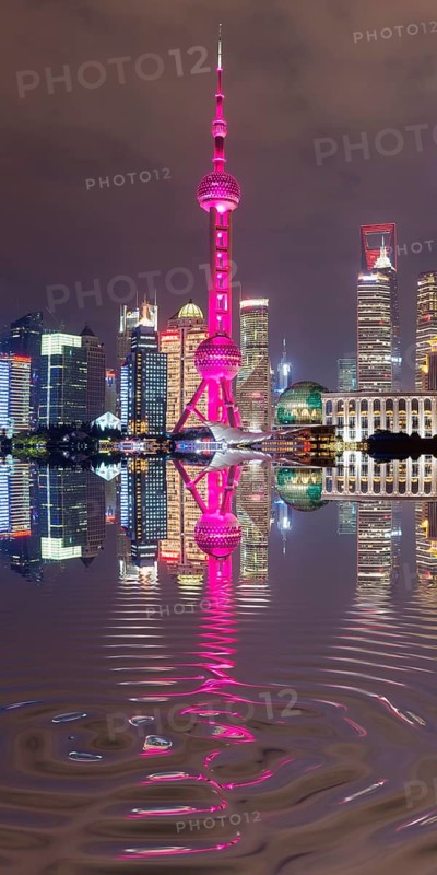 Pudong financial district with Oriental Pearl Tower at night
