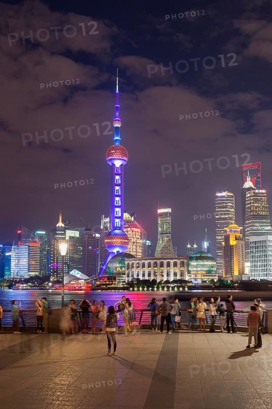Pudong financial district with Oriental Pearl Tower at night