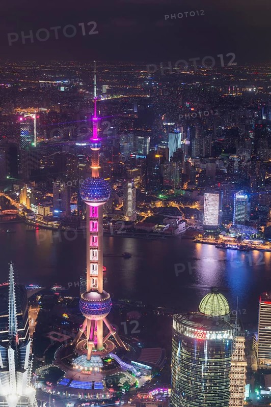 View over Pudong with Oriental Pearl Tower at night