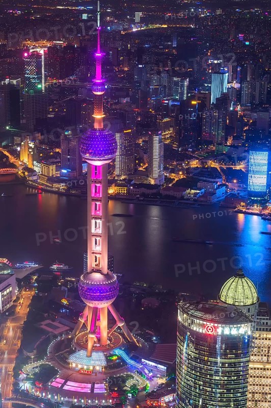 View over Pudong with Oriental Pearl Tower at night