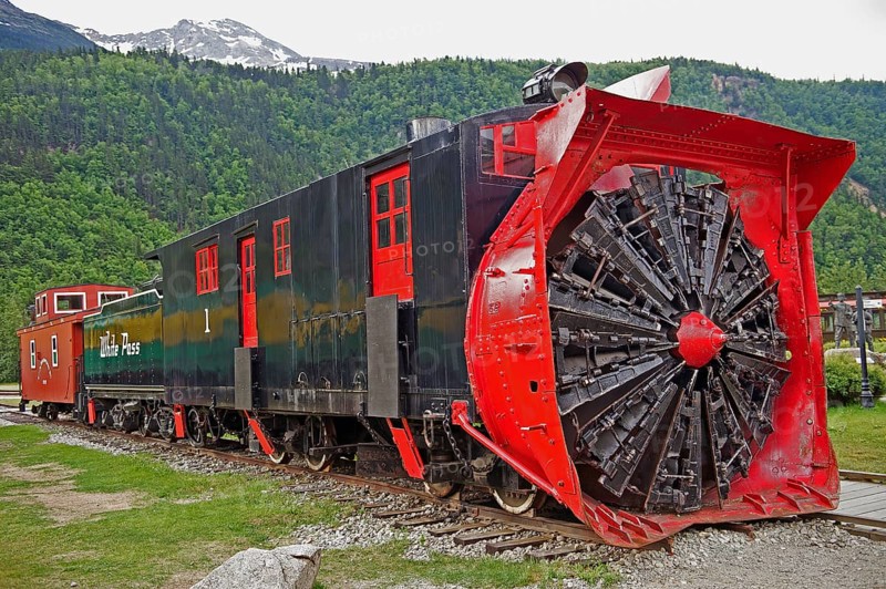 Historic locomotive with snow blower at train station