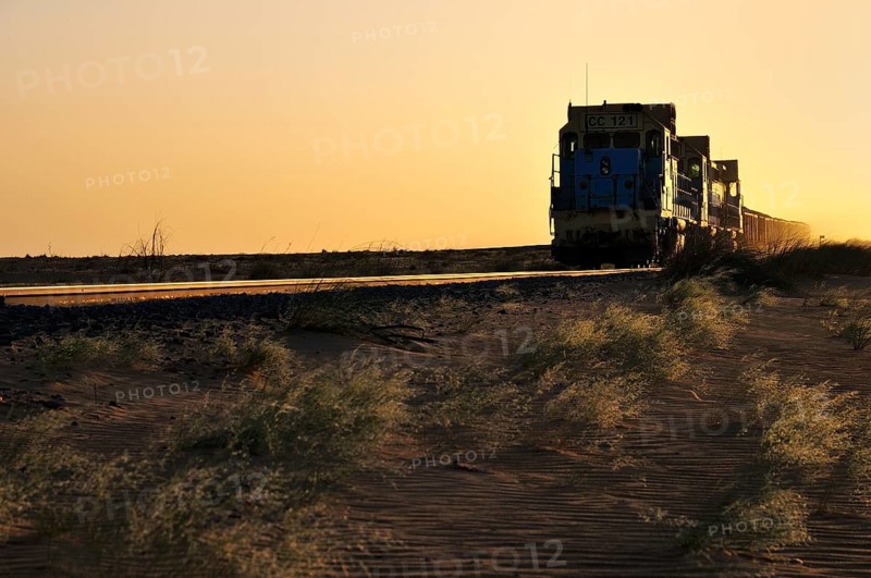 Railway through the desert for the transport of iron ore from M'Haoudat to Nouadhibou port