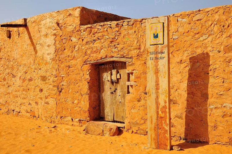 Old wooden door of an Islamic library in the historic centre
