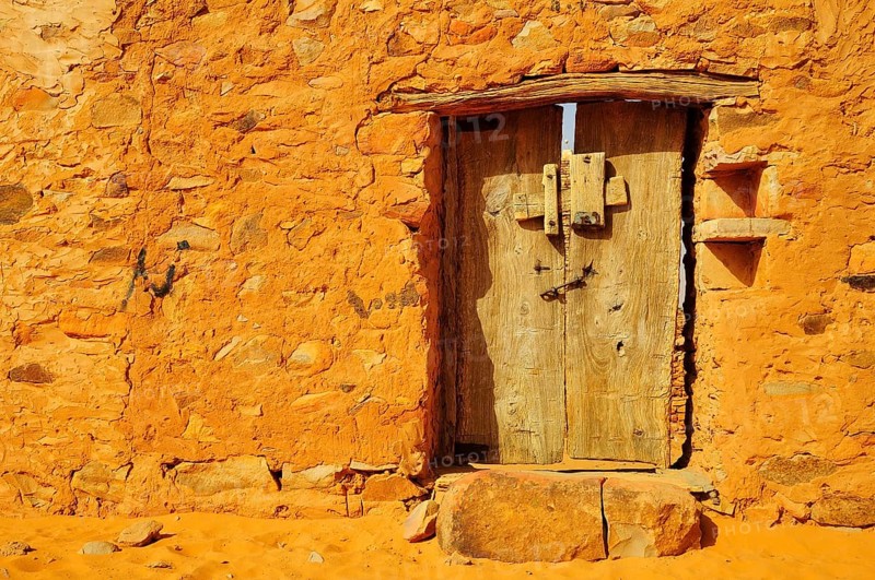 Old wooden door of an Islamic library in the historic centre