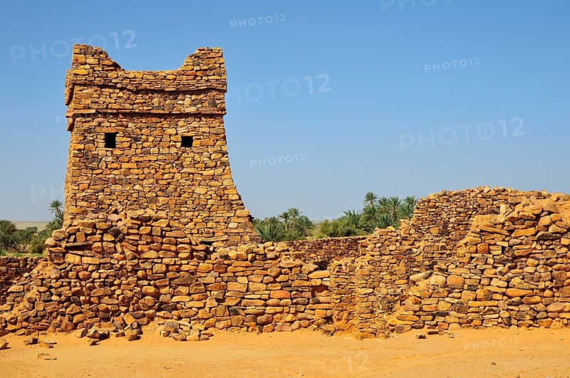 Ruins and minaret of the fortified trading post or Ksar